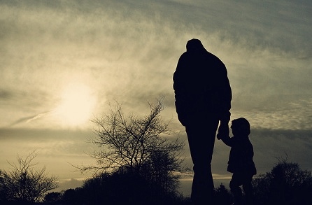 father-child-walking-silhouette