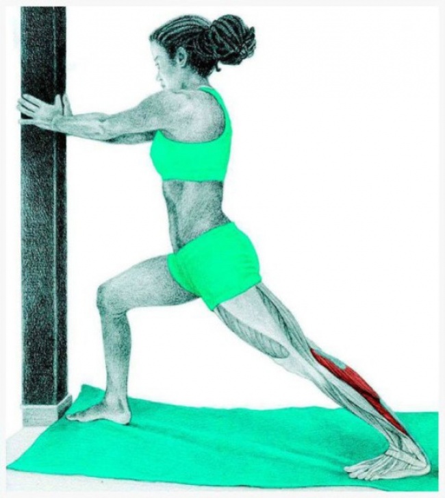 Standing calf stretch at the wall